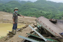 Căn nhà bị đổ sập sau lũ dữ tại Thôn làng Nủ, xã Phúc Khánh. (Ảnh: Hồng Ninh/TTXVN)