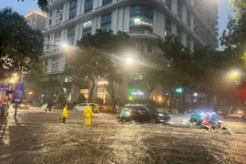 Nhiều khu vực ở Hà Nội có mưa to. (Ảnh: Nguyễn Thắng/TTXVN)