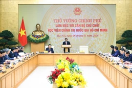 Thủ tướng Phạm Minh Chính làm việc với cán bộ chủ chốt Học viện Chính trị Quốc gia Hồ Chí Minh. (Ảnh: Dương Giang/TTXVN)