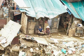 Cuộc sống đang dần trở lại bình thường tại xóm trọ nghèo dưới chân cầu Long Biên (ảnh chụp ngày 15/9/2024). (Ảnh: Khánh Hòa/TTXVN)