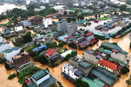 Mưa lũ đã khiến nhiều tuyến đường và hàng nghìn ngôi nhà ở thành phố Hà Giang bị ngập chìm trong nước. (Ảnh: TTXVN phát)