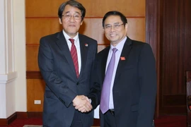 Ông Phạm Minh Chính, Ủy viên Bộ Chính trị, Bí thư Trung ương Đảng, Trưởng Ban Tổ chức Trung ương tiếp Đại sứ Nhật Bản tại Việt Nam Kunio Umeda. (Ảnh: Doãn Tấn/TTXVN)