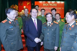 Chủ tịch nước Trần Đại Quang với các lãnh đạo Bộ Công an tham dự Hội nghị. (Ảnh: Nhan Sáng/TTXVN)