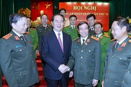 Chủ tịch nước Trần Đại Quang với các lãnh đạo Bộ Công an tham dự Hội nghị. (Ảnh: Nhan Sáng/TTXVN)