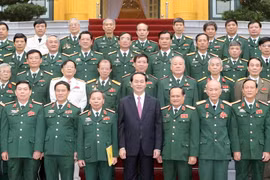 Chủ tịch nước Trần Đại Quang với các đại biểu tại buổi gặp mặt. (Ảnh: Nhan Sáng/TTXVN)