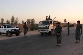 Lực lượng an ninh Afghanistan làm nhiệm vụ trong chiến dịch truy quét phiến quân Taliban tại tỉnh Helmand, Afghanistan ngày 27/8. (Nguồn: EPA/TTXVN)