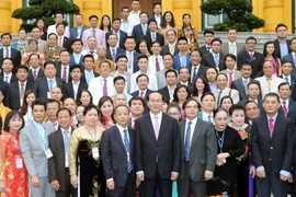 Chủ tịch nước Trần Đại Quang tiếp Đoàn đại biểu Doanh nghiệp vừa và nhỏ tiêu biểu năm 2016. (Ảnh: Nhan Sáng/TTXVN)