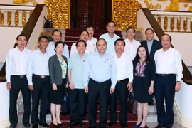Thủ tướng Nguyễn Xuân Phúc với các đại biểu. (Ảnh: Thống Nhất/TTXVN)