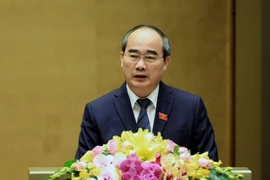 Chủ tịch Ủy ban Trung ương Mặt trận Tổ quốc Việt Nam Nguyễn Thiện Nhân trình bày Báo cáo tổng hợp ý kiến, kiến nghị của cử tri và nhân dân. (Ảnh: Phạm Kiên/TTXVN)