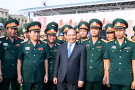 Thủ tướng Nguyễn Xuân Phúc với các đại biểu. (Ảnh: Thống Nhất/TTXVN) 