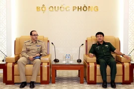 Thượng tướng Võ Văn Tuấn tiếp Giám đốc Chương trình huấn luyện, Ban huấn luyện tích hợp Cục Gìn giữ hòa bình Liên hợp quốc. (Ảnh: An Đăng/TTXVN)