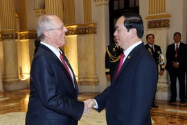 Chủ tịch nước Trần Đại Quang gặp Tổng thống Cộng hòa Peru Pedro Paplo Kuczynsky. (Ảnh: Nhan Sáng/TTXVN)