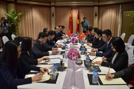 Quang cảnh Phó Thủ tướng, Bộ trưởng Ngoại giao Phạm Bình Minh gặp Bộ trưởng Ngoại giao Trung Quốc Vương Nghị. (Ảnh: Hưng Đa/TTXVN)