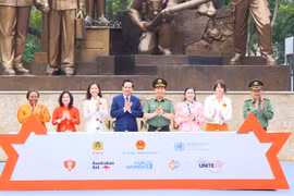 Các đại biểu phát động Tháng hành động vì bình đẳng giới và phòng ngừa, ứng phó với bạo lực trên cơ sở giới năm 2024. (Ảnh: CTV/Vietnam+)