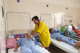 Bệnh nhân điều trị tại Bệnh viện K. (Ảnh: PV/Vietnam+)