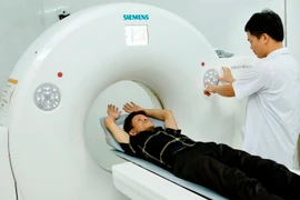 Người dân được thụ hưởng dịch vụ y tế chất lượng cao từ y tế cơ sở tại Trung tâm Y tế Yên Lạc. (Ảnh: Dương Ngọc/TTXVN)