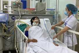 Một trường hợp bị ngộ độc rượu. (Ảnh: PV/Vietnam+)