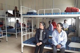 Người dân trong phòng lưu trú của Bệnh viện K. (Ảnh: PV/Vietnam+)