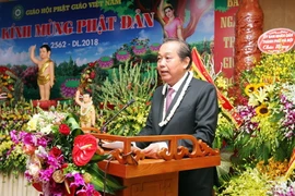 Phó Thủ tướng Thường trực Chính phủ Trương Hòa Bình phát biểu chúc mừng Đại lễ Phật đản 2018. (Ảnh: Nguyễn Dân/TTXVN)