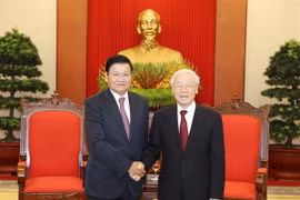 Tổng Bí thư Nguyễn Phú Trọng tiếp Thủ tướng Lào Thongloun Sisoulith. (Ảnh: Trí Dũng/TTXVN) 