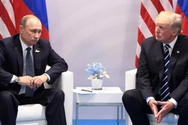 Tổng thống Mỹ Donald Trump và Tổng thống Nga Vladimir Putin. (Ảnh: AFP/TTXVN)