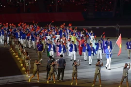 Đoàn Việt Nam trong lễ khai mạc. (Ảnh: Quốc Khánh/TTXVN)