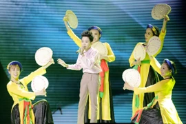 Đình Tâm trong đêm bán kết Giọng hát Việt nhí 2017. (Ảnh: BTC)