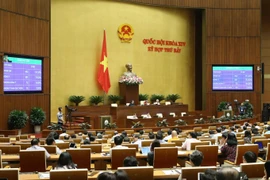 Trong ảnh: Tỷ lệ Đại biểu Quốc hội thông qua nội dung thứ 3 của dự thảo Luật Phòng, chống tác hại của rượu, bia. (Ảnh: Doãn Tấn/TTXVN)