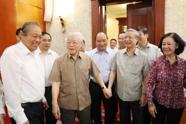 Tổng Bí thư, Chủ tịch nước Nguyễn Phú Trọng và các đại biểu tham dự cuộc họp. (Ảnh: Trí Dũng/TTXVN)