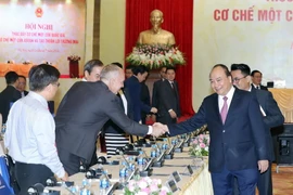 Thủ tướng Nguyễn Xuân Phúc và các đại biểu tham dự hội nghị. (Ảnh: Thống Nhất/TTXVN)