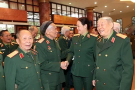 Các đại biểu cán bộ cao cấp quân đội nghỉ hưu trong cuộc gặp mặt ngày 11/1. (Ảnh: Trọng Đức/TTXVN)