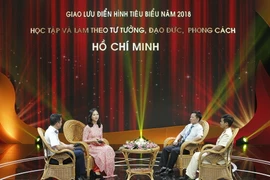 Các đại biểu tham dự chương trình giao lưu. (Ảnh: Văn Điệp/TTXVN)