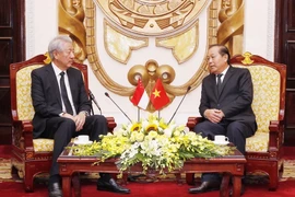 Phó Thủ tướng Thường trực Trương Hòa Bình tiếp Phó Thủ tướng Singapore Tiêu Chí Hiền. (Ảnh: Lâm Khánh/TTXVN)