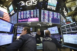 Giao dịch viên tại Sàn giao dịch chứng khoán New York, Mỹ. (Nguồn: THX/TTXVN)