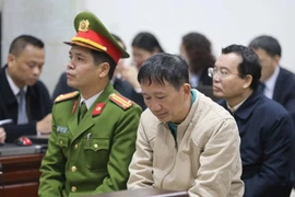 Bị cáo Trịnh Xuân Thanh và đồng phạm tại phiên tòa. (Ảnh: Doãn Tấn/TTXVN)
