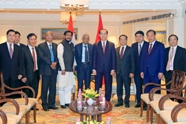 Chủ tịch nước Trần Đại Quang và ông Sudhakar Reddy, Chủ tịch Đảng Cộng sản Ấn Độ. (Ảnh: Nhan Sáng/TTXVN)