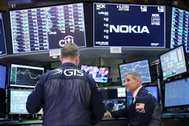 Giao dịch viên tại Sàn giao dịch chứng khoán New York, Mỹ ngày 21/5. (Nguồn: THX/TTXVN)