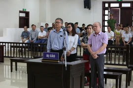 Các bị cáo nghe Hội đồng xét xử tuyên án. (Ảnh: Dương Giang/TTXVN)