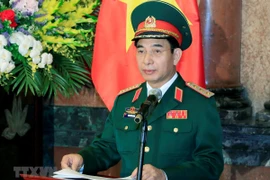 Thượng tướng Phan Văn Giang, Tổng Tham mưu trưởng Quân đội nhân dân Việt Nam, Thứ trưởng Bộ Quốc phòng phát biểu khai mạc hội nghị. (Ảnh: Dương Giang/TTXVN)