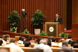 Chủ nhiệm Ủy ban Tài chính-Ngân sách của Quốc hội Nguyễn Đức Hải trình bày Báo cáo giải trình, tiếp thu và chỉnh lý dự thảo Nghị quyết về phê chuẩn quyết toán ngân sách Nhà nước năm 2016. (Ảnh: Dương Giang/TTXVN)