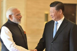 Thủ tướng Ấn Độ Narendra Modi (trái) và Chủ tịch Trung Quốc Tập Cận Bình. (Nguồn: PMO Twitter)