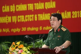 Thượng tướng Lương Cường, Bí thư Trung ương Đảng, Chủ nhiệm Tổng cục Chính trị Quân đội nhân dân Việt Nam phát biểu chỉ đạo hội nghị. (Ảnh: Dương Giang/TTXVN)