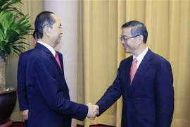 Chủ tịch nước Trần Đại Quang tiếp Chánh án Tòa án Nhân dân Tối cao Trung Quốc Chu Cường. (Ảnh: Nhan Sáng/TTXVN)