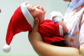 Em bé sơ sinh chào đời tại bệnh viện Bangkok, Thái Lan. (Nguồn: THX/TTXVN)