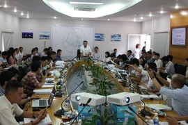 Buổi giải trình các vấn đề liên quan đến dự án giải quyết ngập do triều. (Ảnh: Xuân Dự/TTXVN)