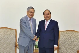 Thủ tướng Chính phủ Nguyễn Xuân Phúc tiếp ông Phạm Tuấn Phan, Giám đốc Điều hành của Ban Thư ký Ủy hội sông Mekong quốc tế. (Ảnh: Thống Nhất/TTXVN)