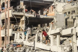 Một trường học ở Dải Gaza bị phá hủy sau cuộc tấn công của Israel. (Ảnh: THX/TTXVN)