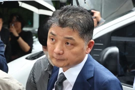 Ông Kim Beom-su, nhà sáng lập tập đoàn công nghệ Kakao Corp, tại Tòa án quận Nambu ở Seoul, Hàn Quốc. (Ảnh: Yonhap/TTXVN)