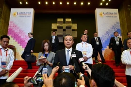 Bộ trưởng Ngoại giao Trung Quốc Vương Nghị (trong ảnh) nhấn mạnh Trung Quốc "chắc chắn sẽ triển khai nghị quyết mới 100%, đầy đủ và nghiêm túc. (Nguồn: AFP/TTXVN)