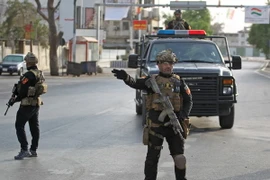 Lực lượng an ninh đặc nhiệm Iraq tuần tra ở thành phố miền bắc Kirkuk trong thời điểm người Kurd tiến hành bỏ phiếu trưng cầu dân ý. (Nguồn: AFP/ TTXVN)
